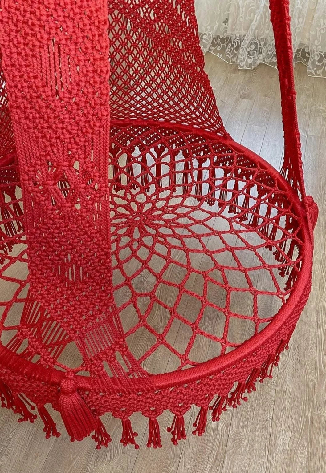 Fiery Elegance: Red Macrame Swing to Add Bold Charm to Your Space