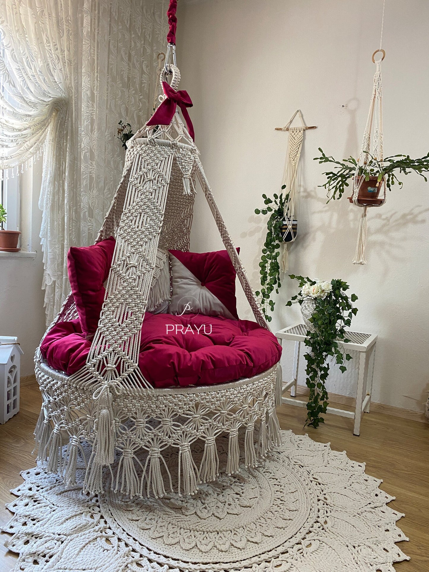 Lounge in Luxe with Our 50-Inch Sangria Red and Silver Boho Swing